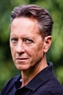 Richard E. Grant isDr. Zander Rice